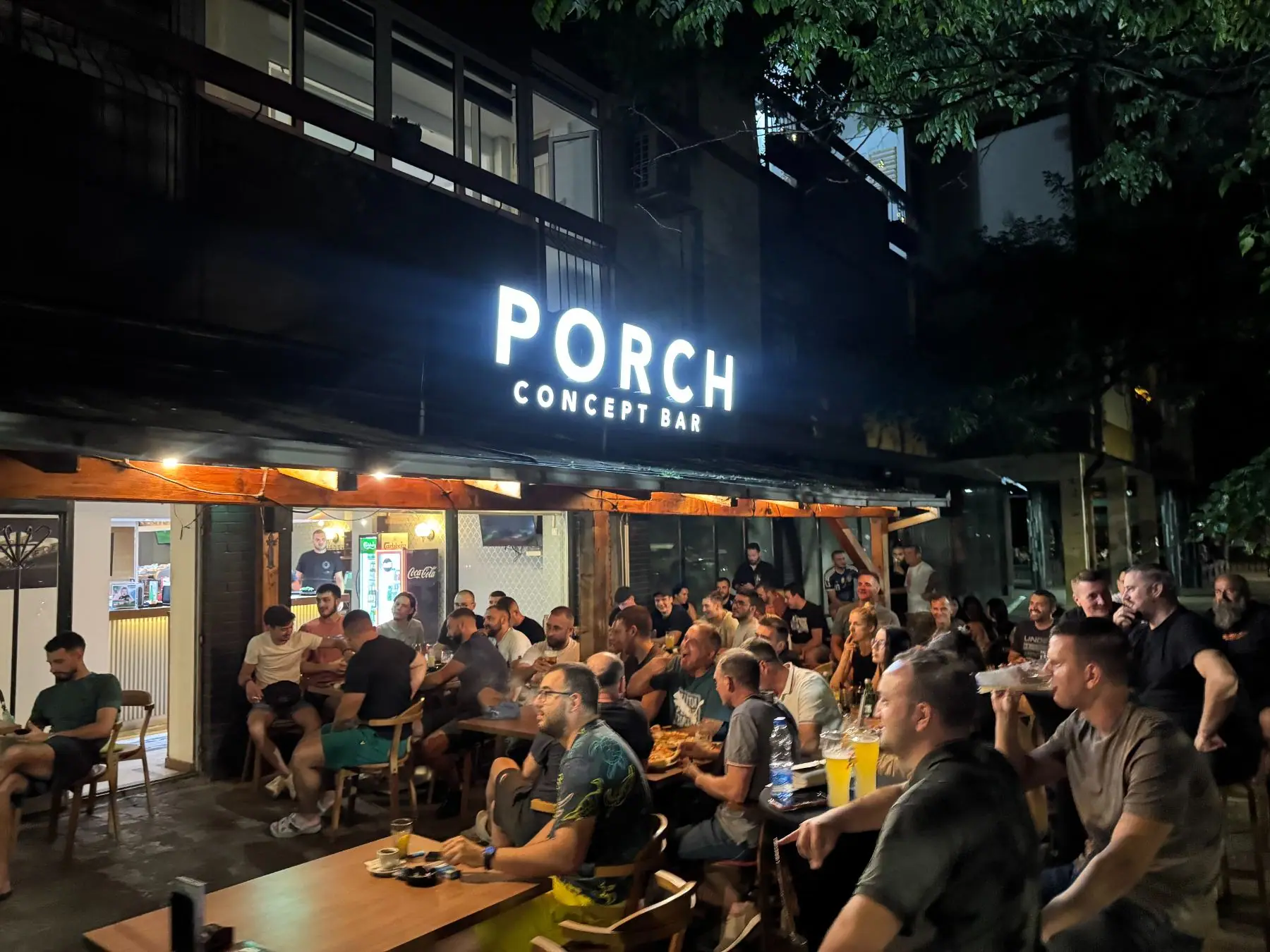 A full Porch on a summer night